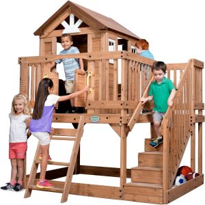 Backyard Discovery Scenic Heights Elevated Cedar Wooden Kids Playhouse with Play Kitchen, Wrap-Around Deck, Toy Storage Bench, Saloon-Style Doors, Ladder, Stairs, and Growth Chart for Outdoor Play B01M0QFE35